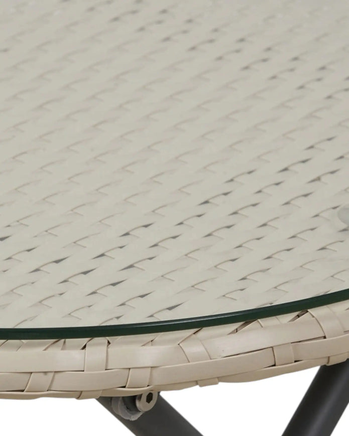 Cream rattan garden furniture set with a chair and table by Pacific Lifestyle Ltd, designed for outdoor relaxation.
