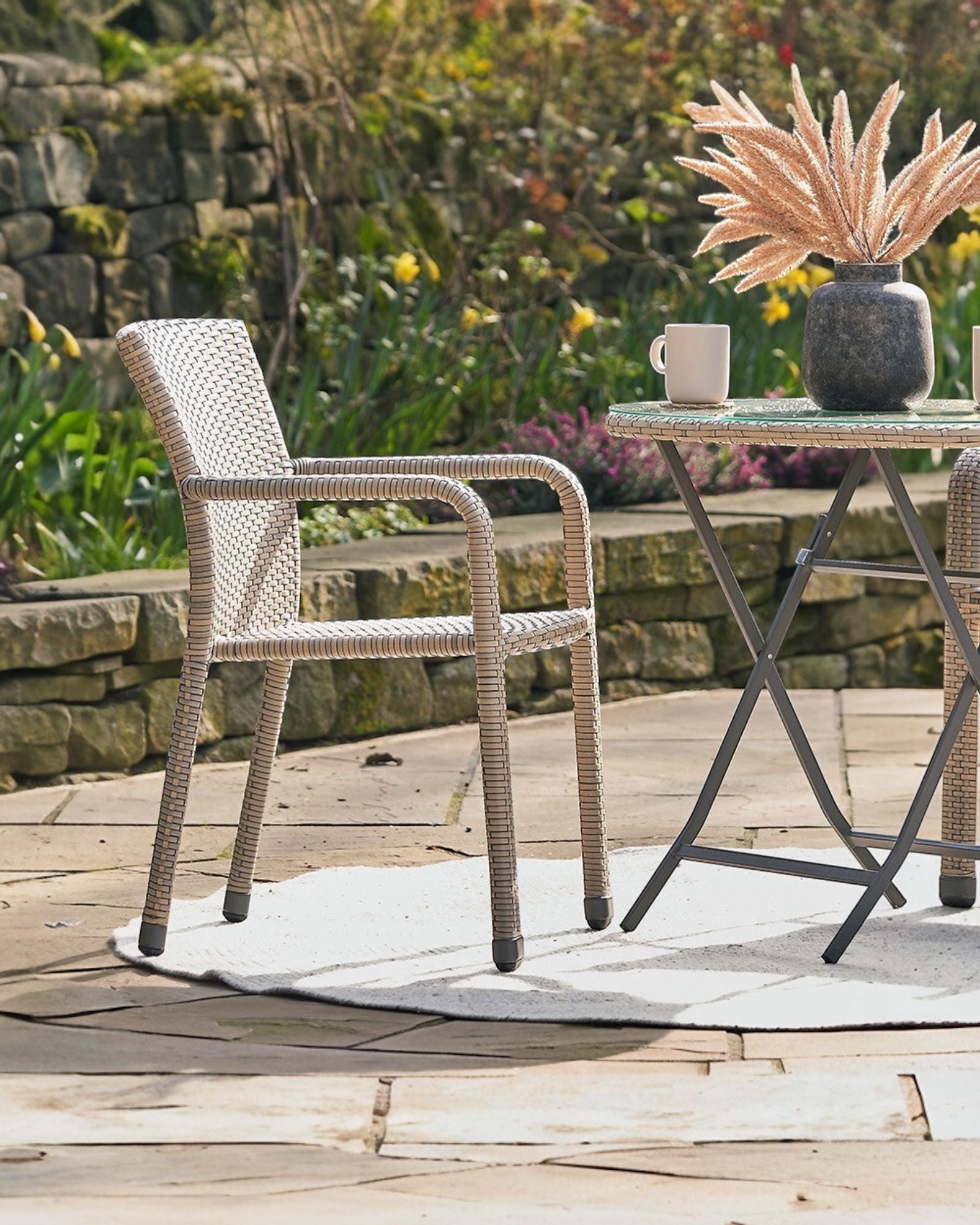 Pacific Lifestyle Ltd rattan bistro garden furniture set with sofa chair and table, perfect for outdoor patio or garden seating