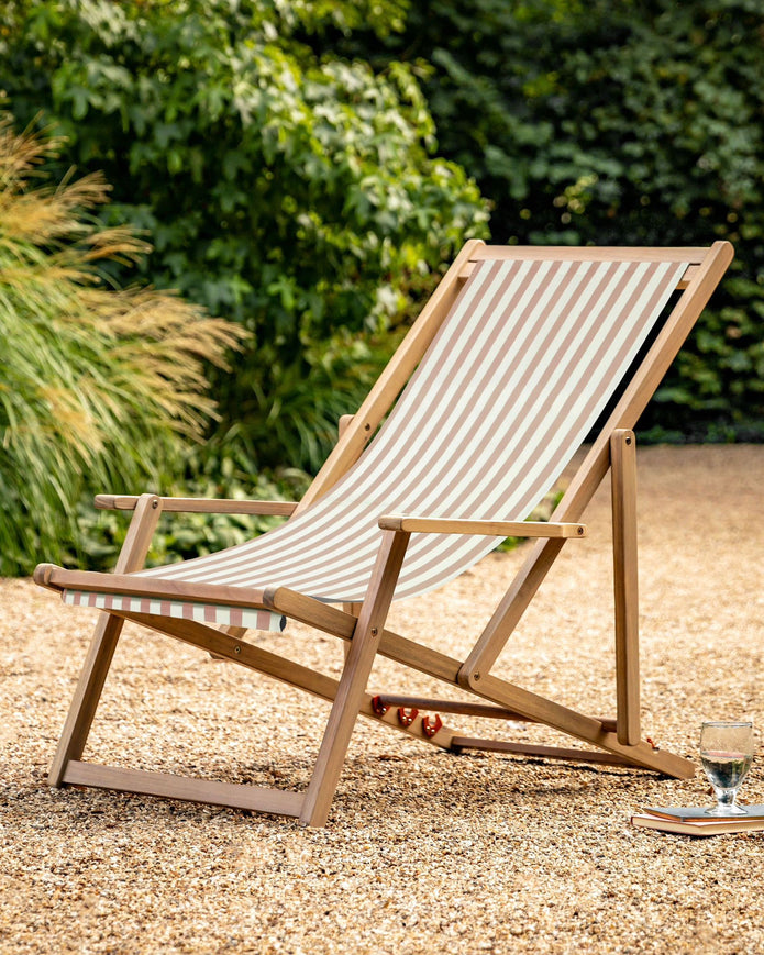 Creta wooden striped beige garden chair by Gallery Direct, showcasing its woven wooden design and comfortable outdoor seating