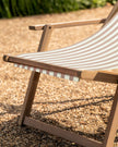Beige Creta Wooden Stripped Garden Chair by Gallery Direct, showing a stylish outdoor seating option with wooden slats and a beige finish.