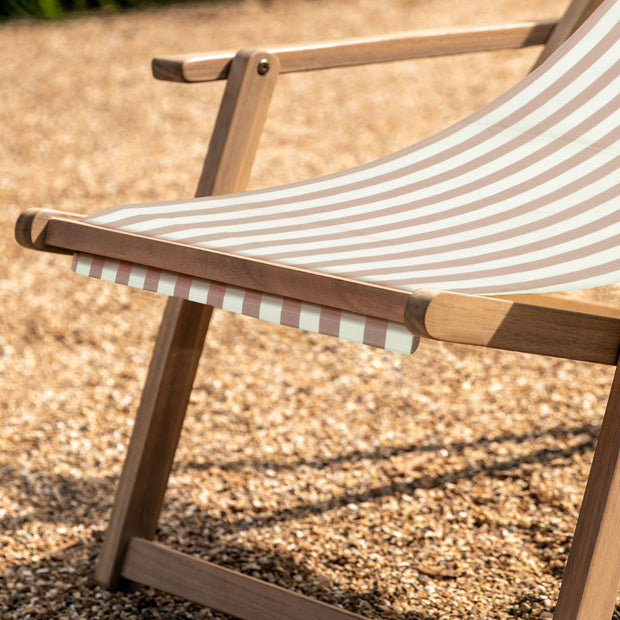 Beige Creta Wooden Stripped Garden Chair by Gallery Direct, showing a stylish outdoor seating option with wooden slats and a beige finish.