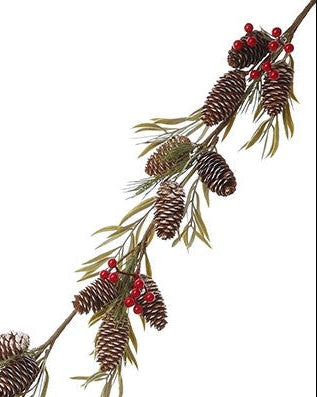 Decorative garland with pine cones and red berries on a white background