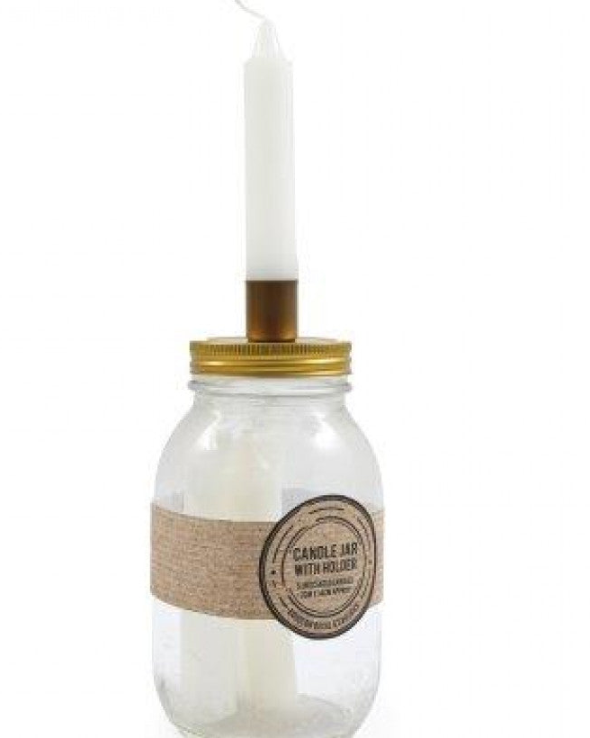 Ivory Candles In A Glass Storage Jar And Holder