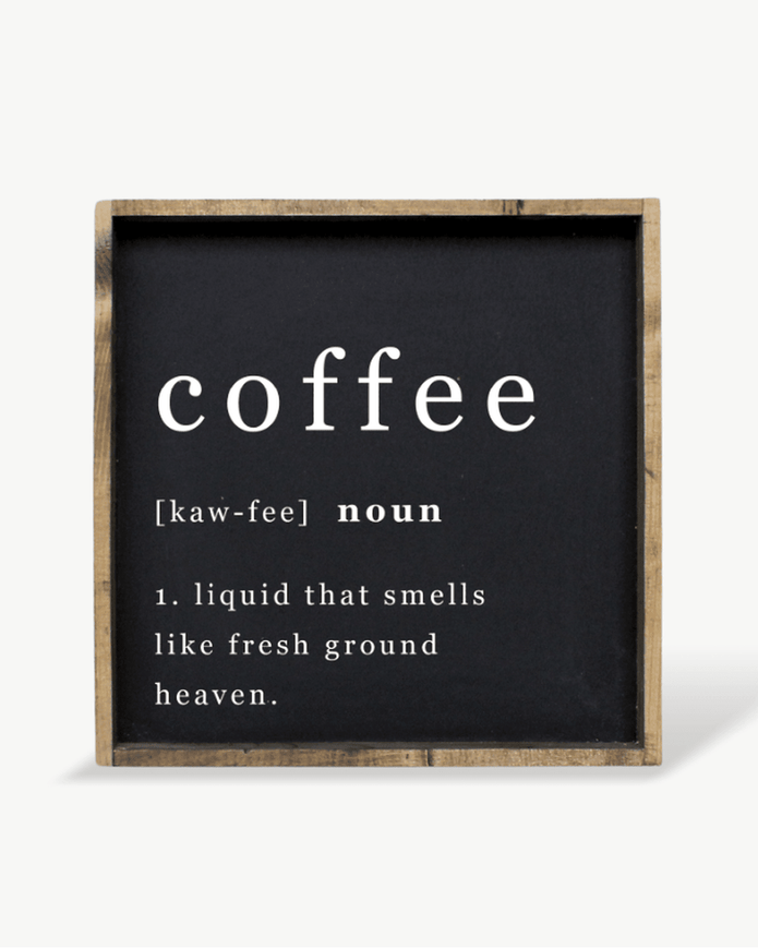 Decorative sign with the word 'coffee' and its definition on a black background with wooden frame.