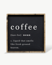 Decorative sign with the word 'coffee' and its definition on a black background with wooden frame.