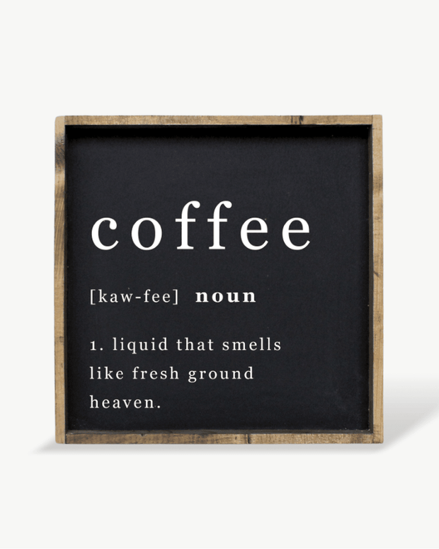 Decorative sign with the word 'coffee' and its definition on a black background with wooden frame.