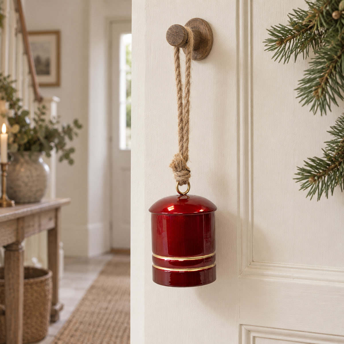 Glossy Red Metal Cowbell On Hanger – styled British country home view