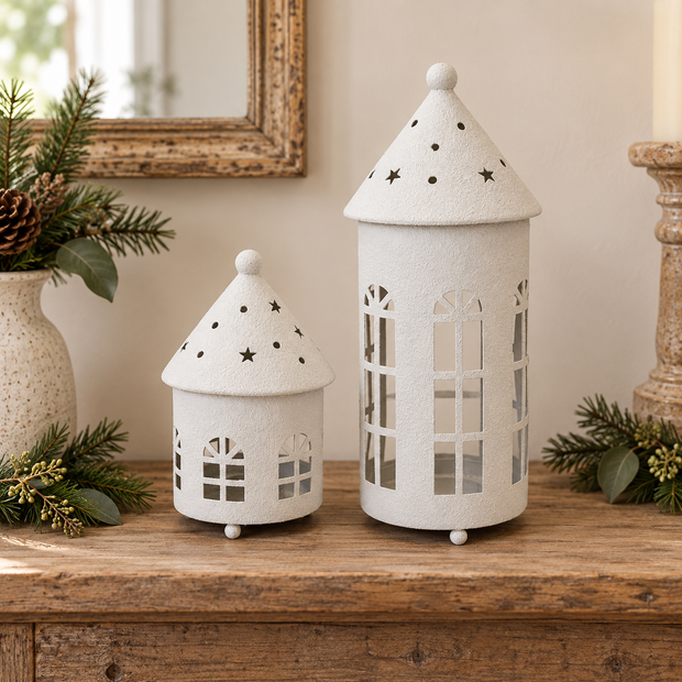 White rounded metal tealight houses in Small and Large sizes styled side by side