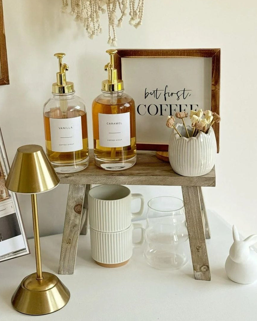 Wooden display riser bench showing tiered home decor arrangement