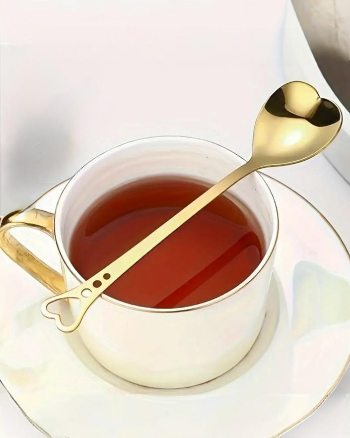 Starlight Express gold heart handle spoon for kitchen and dining, featuring a decorative gold heart-shaped handle.