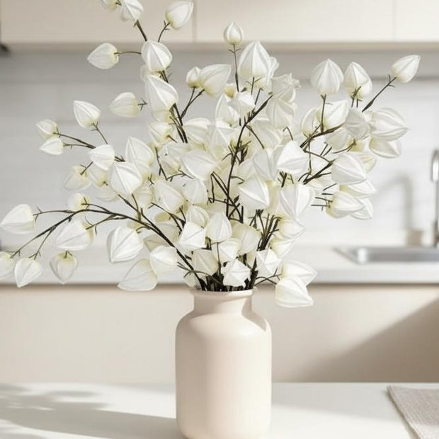 Artificial white lantern stem from Starlight Express, realistic white plant with lantern-shaped blooms for decorative arrangements.