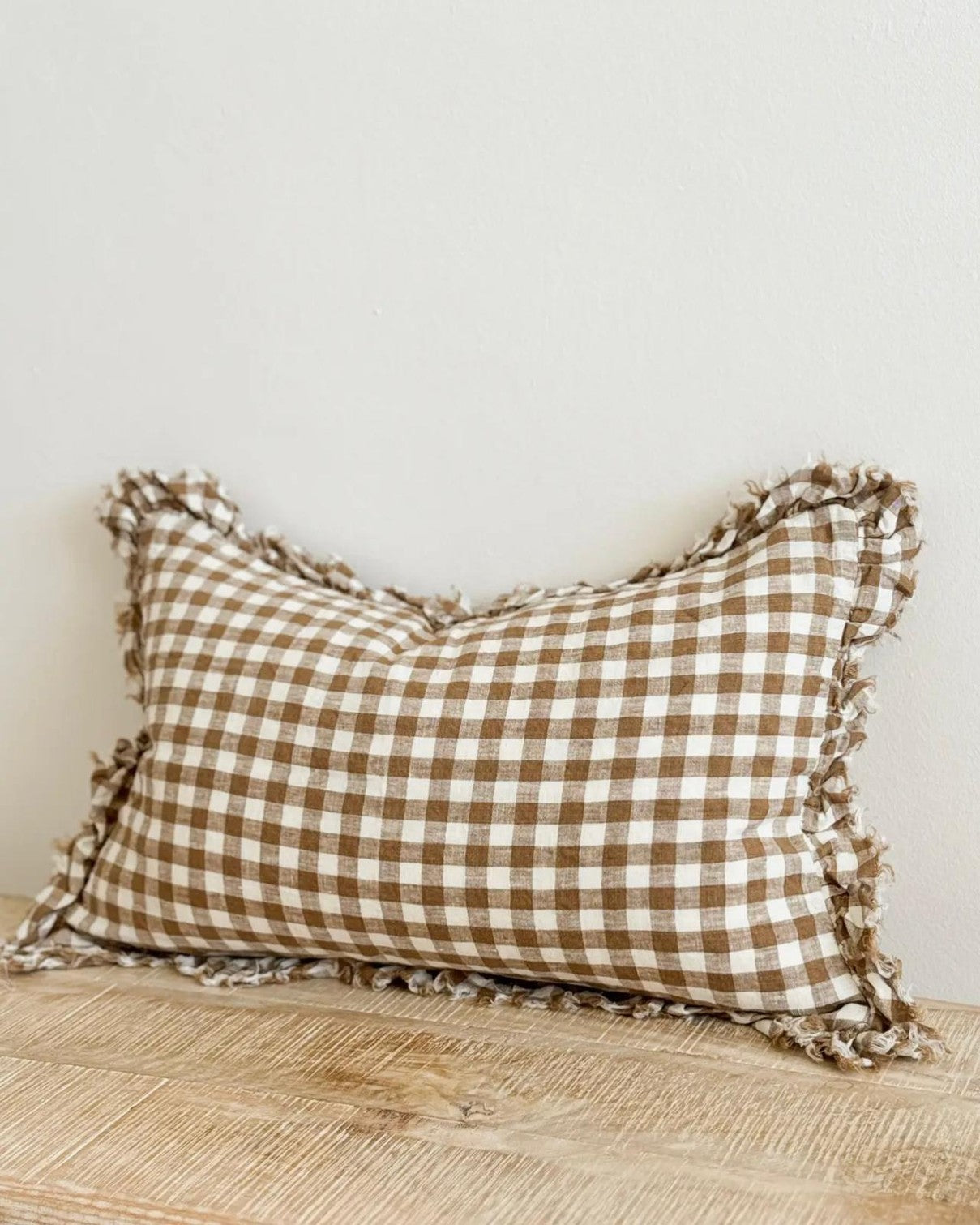 Brown rectangle gingham cushion cover from Ellenvale Trade, soft furnishings with a classic checkered pattern and fabric texture.