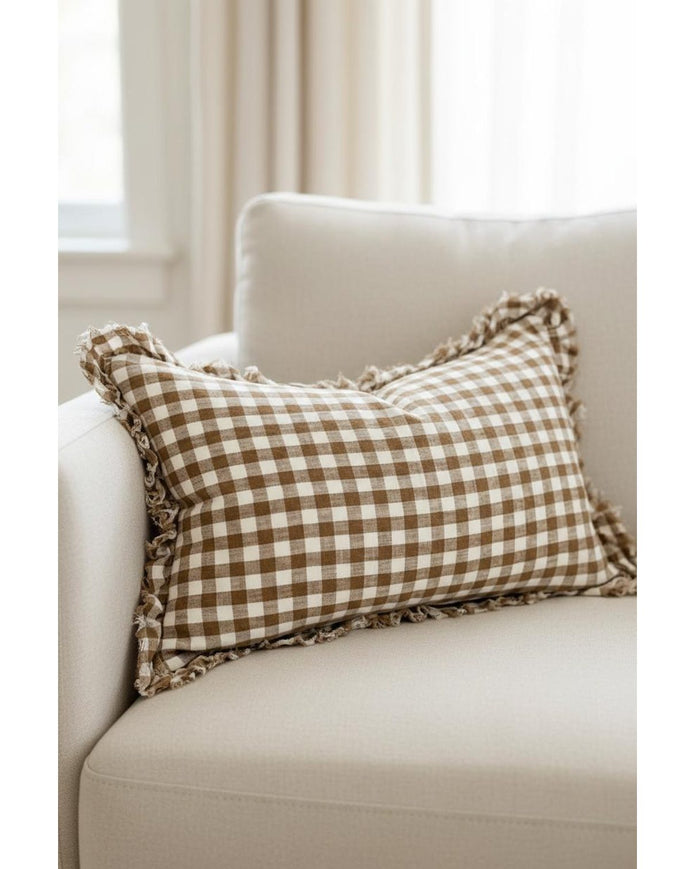 Brown rectangle gingham cushion cover by Ellenvale Trade, soft furnishings with classic check pattern, shown on a sofa.