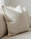 Cream neutral square Sofia boucle cushion cover from Ellenvale Trade, showcasing soft textured fabric and stylish design.