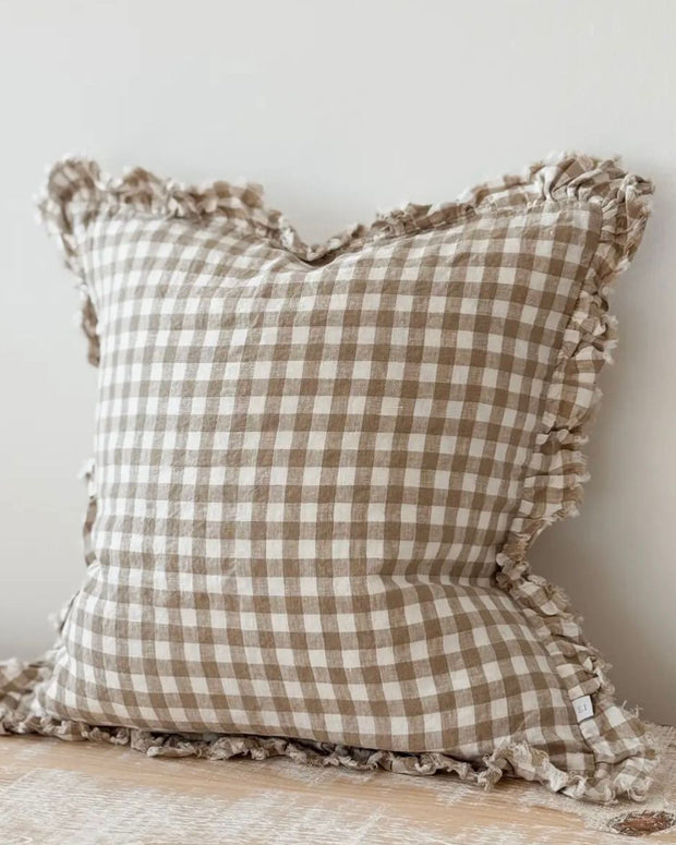 Brown square gingham cushion cover with soft furnishings design, featuring a classic checkered pattern and tailored edges.
