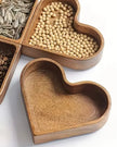 Small dark wood heart dish from Starlight Express, perfect for kitchen and dining decor, with a smooth heart-shaped design.