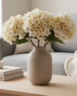 Artificial soft cream hydrangea stem from Starlight Express, showcasing delicate, short, and realistic hydrangea blooms for home decor.