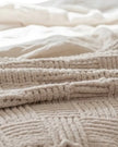 Beige checkered chenille chunky knit blanket throw from Starlight Express, soft and cozy for home decor and comfort.