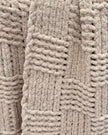 Beige checkered chenille chunky knit blanket throw from Starlight Express, soft furnishings with cozy, textured fabric.