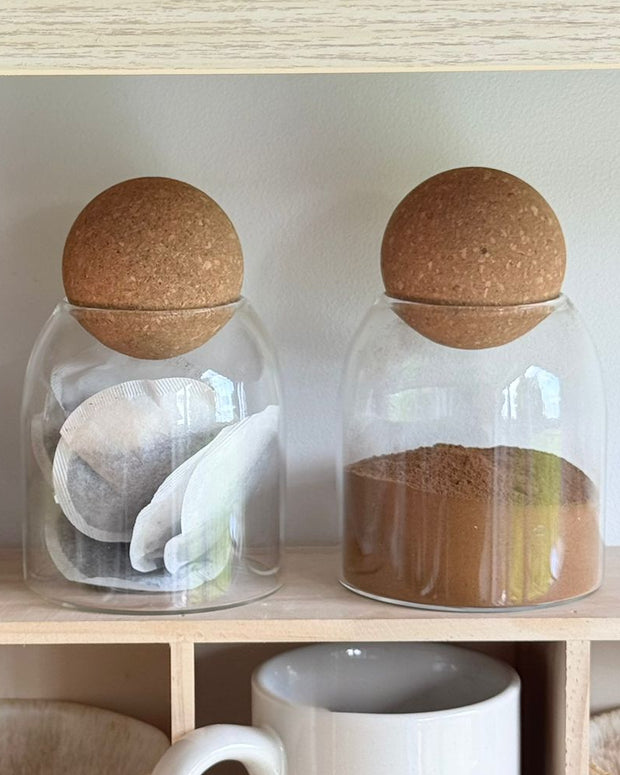 Starlight Express glass storage jar with cork ball lid, ideal for pantry organization and kitchen storage.