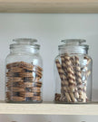 Clear glass pantry storage jar with a lid, ideal for kitchen and dining organization, by Clayre & Eef.