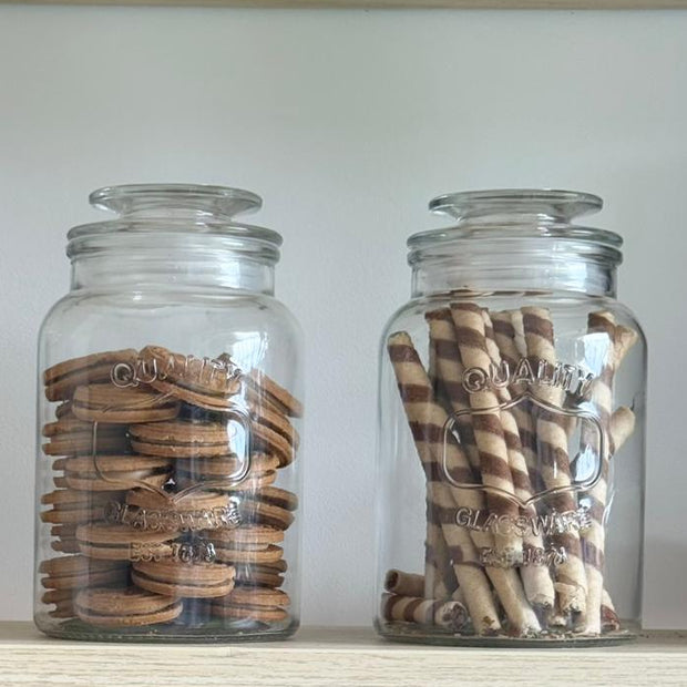 Clear glass pantry storage jar with a lid, ideal for kitchen and dining organization, by Clayre & Eef.