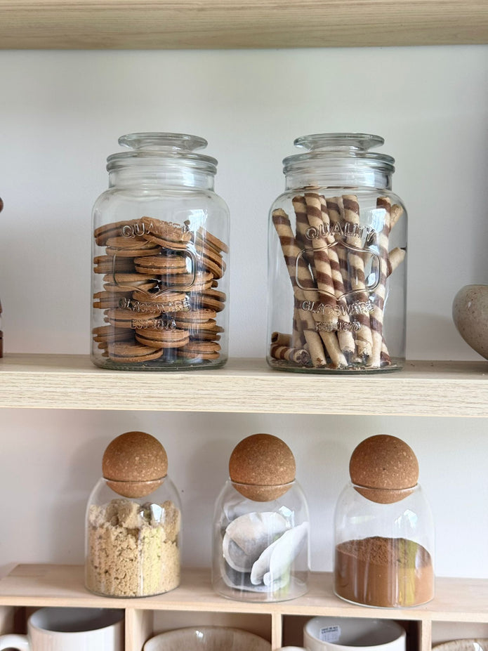 Transparent glass pantry storage jar with a lid, ideal for kitchen organization, by Clayre & Eef.
