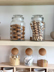 Transparent glass pantry storage jar with a lid, ideal for kitchen organization, by Clayre & Eef.