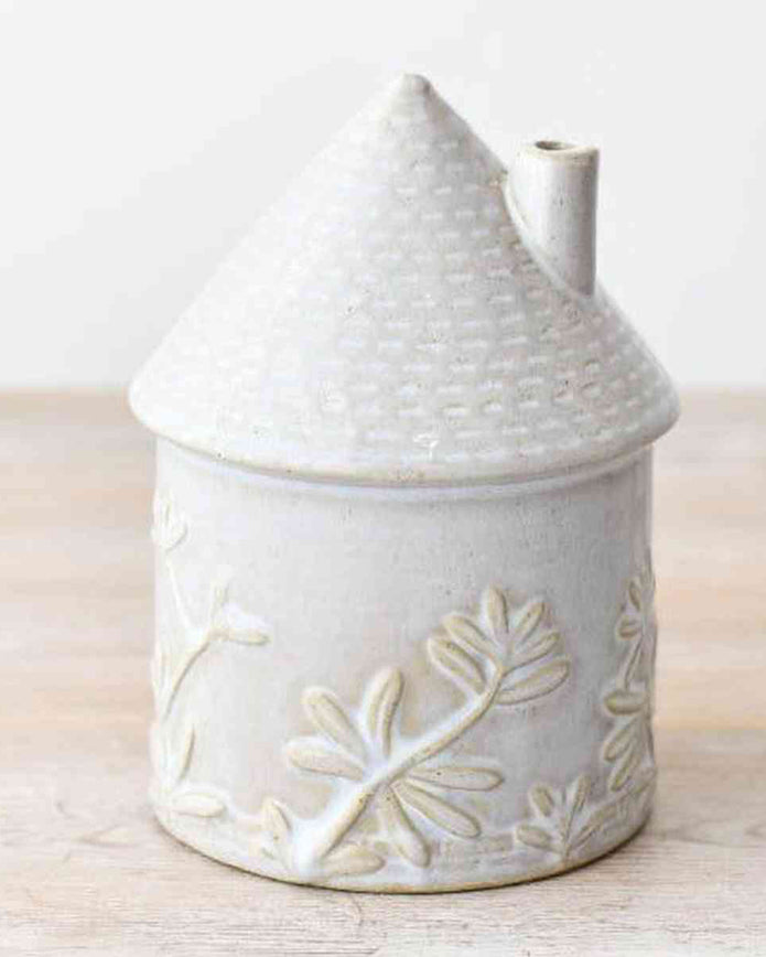 White Ceramic House With Flower Detailing