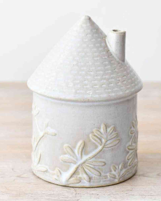 White Ceramic House With Flower Detailing