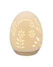 Decorative egg-shaped lamp with floral patterns on a white background