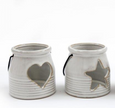 White Ceramic Tealight Holder With Handle, cream lanterns with heart and star cutouts