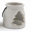 White Ceramic Tealight Holder With Handle, close-up of the cream tree-cutout lantern