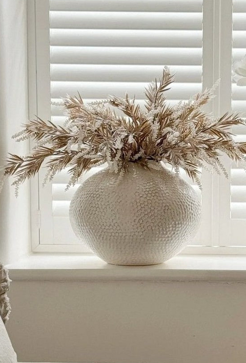 Ivory caldron textured vase by Hill Interiors, showcasing a rounded, decorative ceramic vase with intricate surface details.