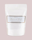 White scented candle sand kit by The Candledust, featuring diamond dust accents for home fragrance and decorative use.