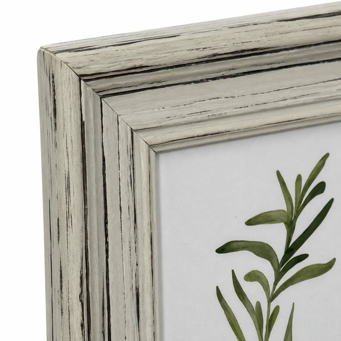 Close-up of Alba frame's distressed wooden finish and stepped mitred corner