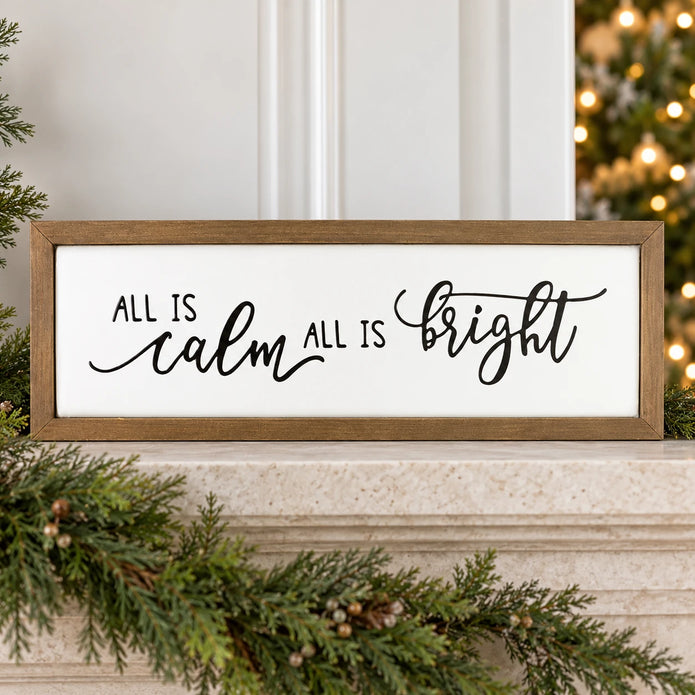 All Is Calm All Is Bright framed sign on a Christmas mantel