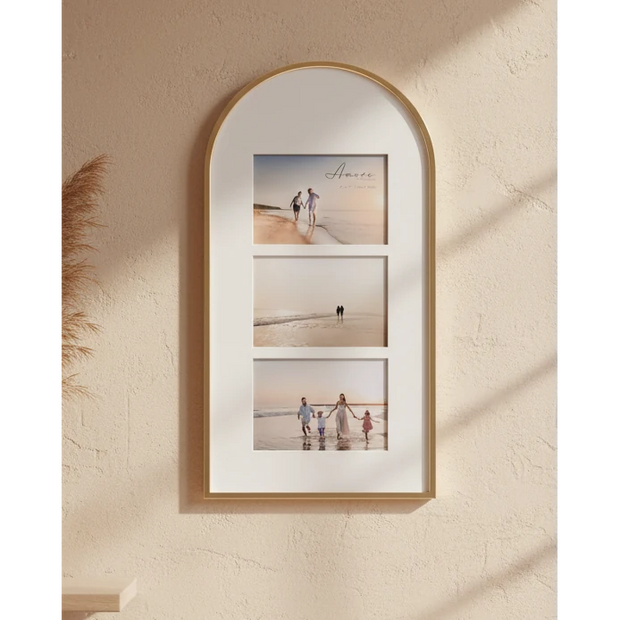 Arched Top Gold And White Multi Photo Frame, gold arched frame with three photographs on a wall