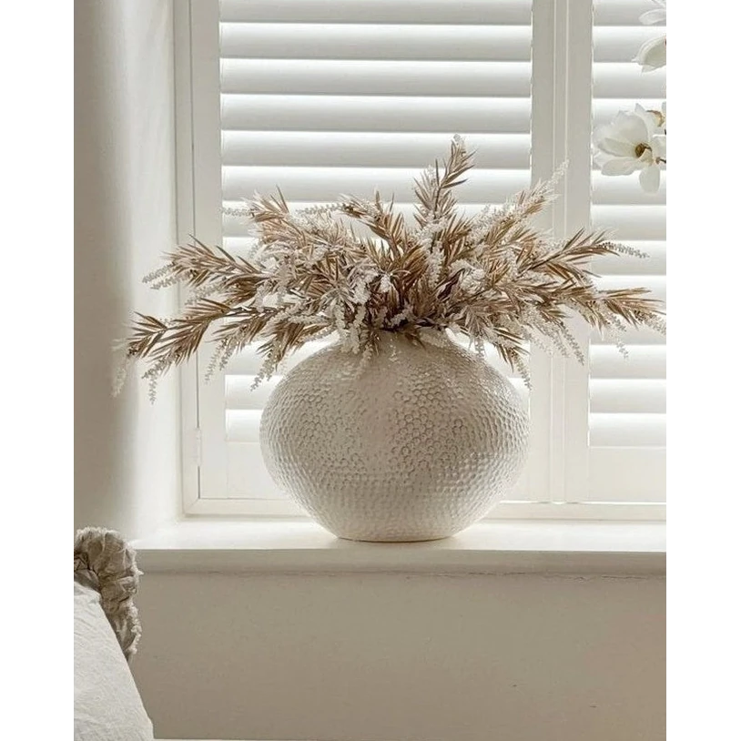 Ivory textured caldron vase by Hill Interiors with a rounded, decorative shape suitable for modern home decor.