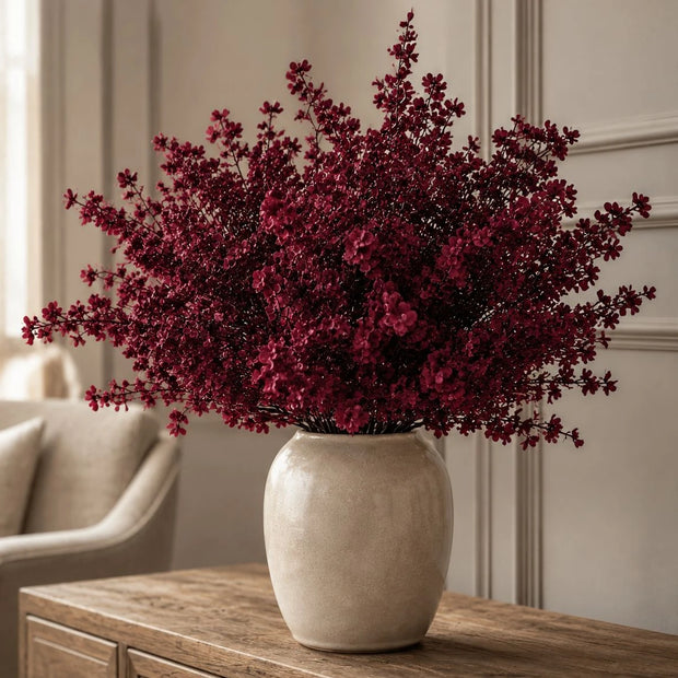 Artificial Burgundy Gypsophelia Stem, burgundy flowering stems in a beige vase on a coffee table