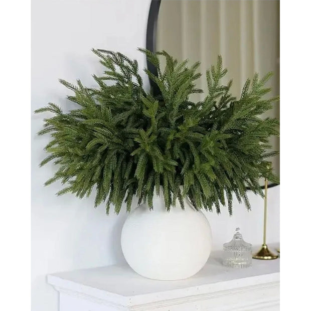 Artificial luxury green spruce Norfolk stem for Christmas décor, by Starlight Express, showcasing lush green needle details.