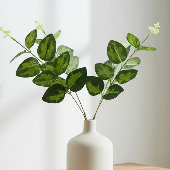 Artificial variegated foliage leaf stem from Hill Interiors, realistic plastic plant stem with green and white variegated leaves.