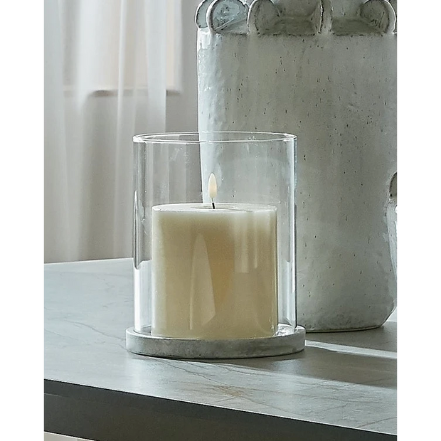 Natural stone hurricane candle lantern for home decor by Hill Interiors, featuring a clear glass enclosure and rustic design.