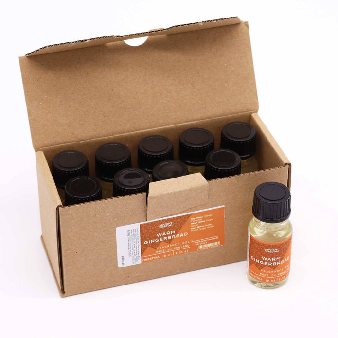 Ancient Wisdom Warm Gingerbread Christmas fragrance oil 10ml bottle with gingerbread and spice design on the label.