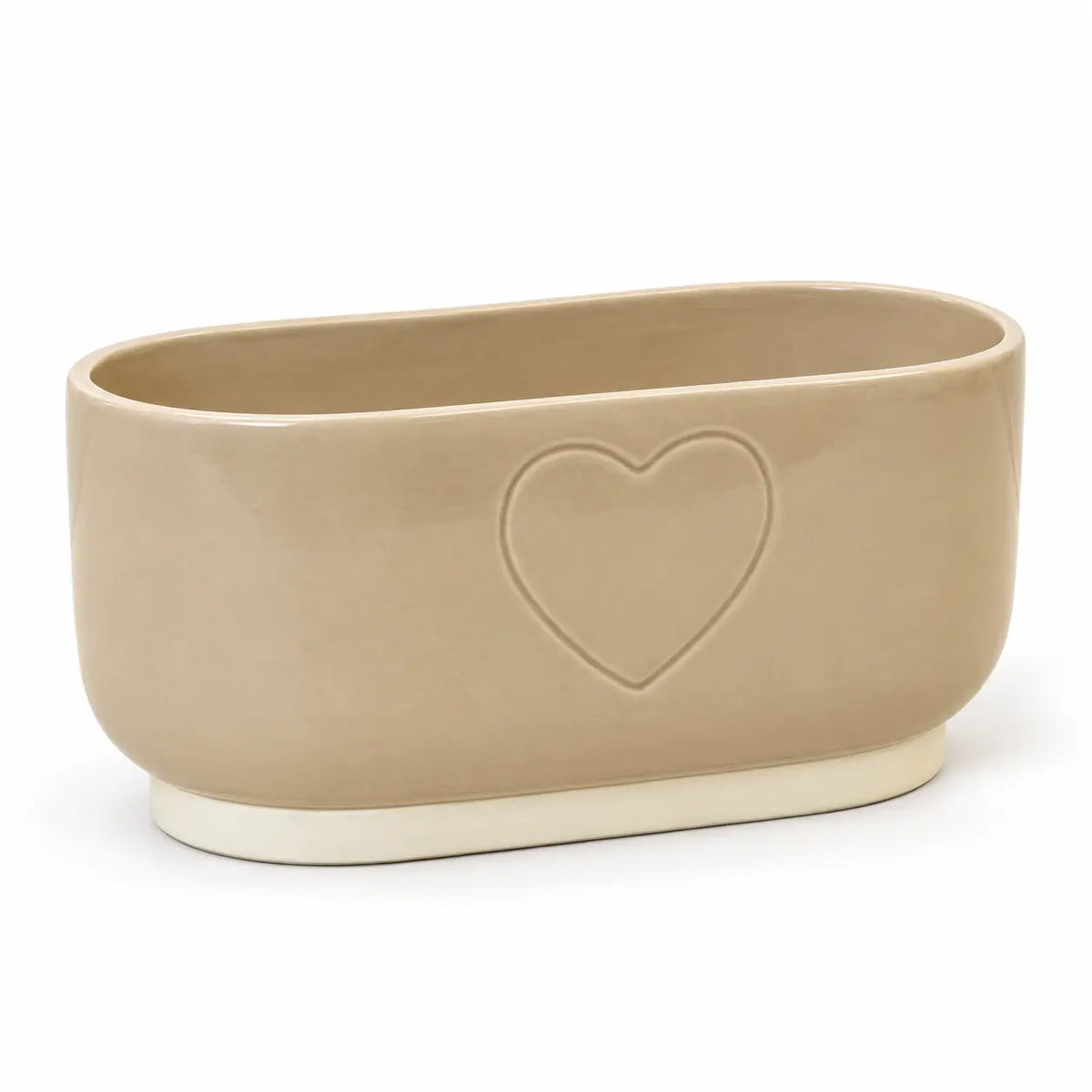 Empty beige ceramic heart planter with cream base on a white background