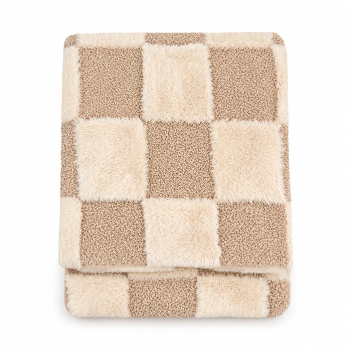 Riva Home beige and cream fur boucle check blanket throw on a white studio background