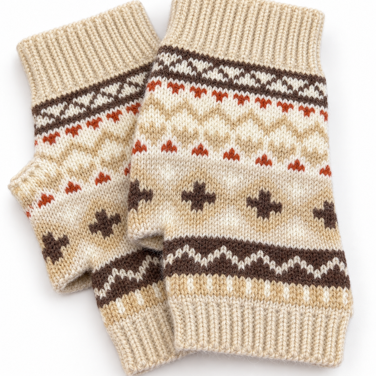Close-up of beige, brown and rust Nordic knit fingerless gloves