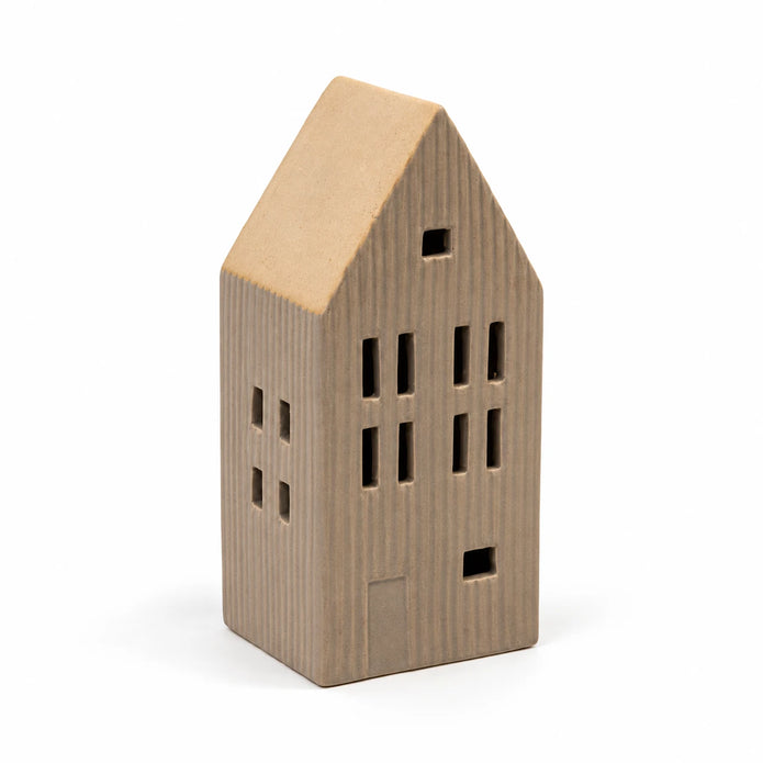 Beige ceramic LED house with sand roof, unlit on a white studio background