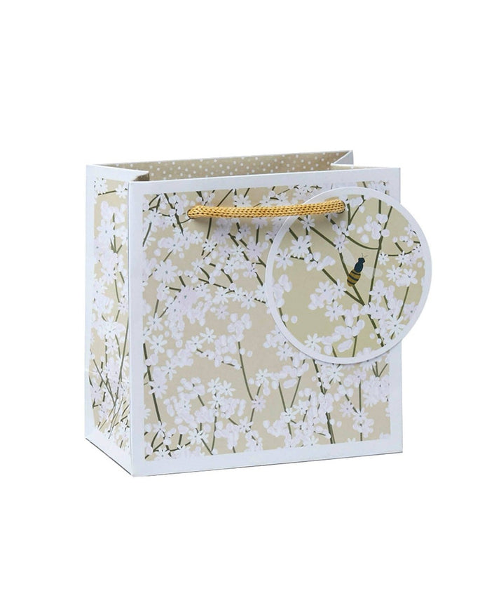 Small gift bag with natural gypsophila floral design, made by Belly Button Designs, perfect for gift wrapping.
