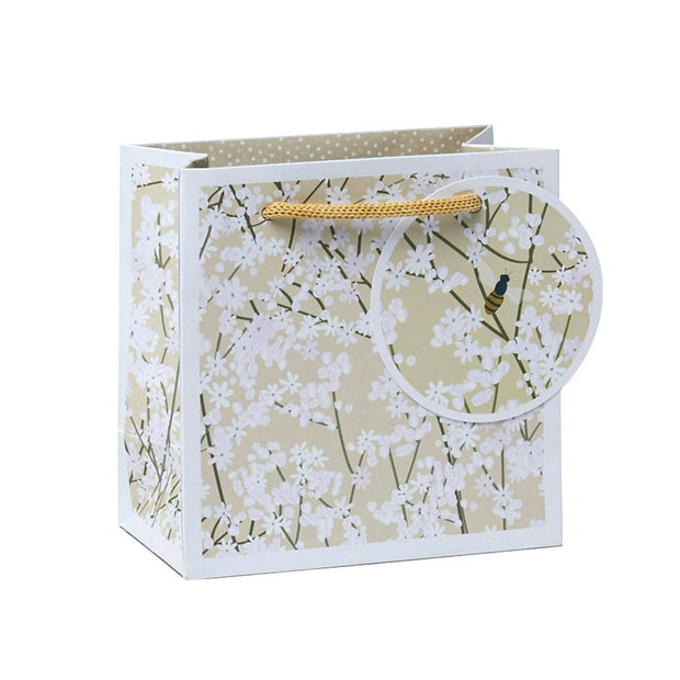 Small gift bag with natural gypsophila floral design, made by Belly Button Designs, perfect for gift wrapping.